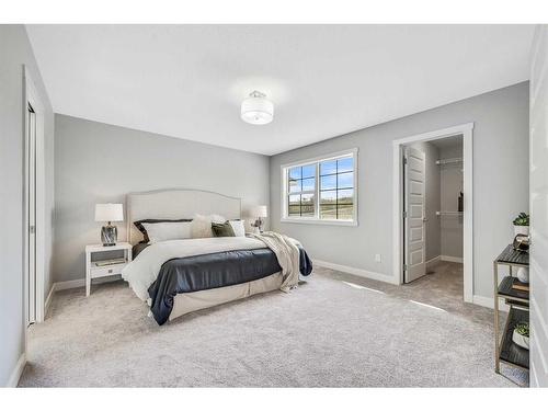 1378 Bayview Crescent Sw, Airdrie, AB - Indoor Photo Showing Bedroom