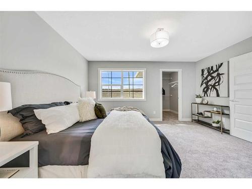 1378 Bayview Crescent Sw, Airdrie, AB - Indoor Photo Showing Bedroom