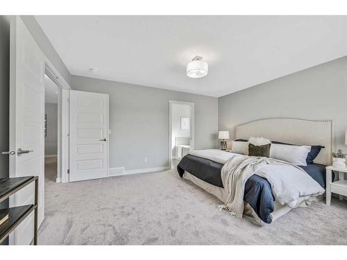 1378 Bayview Crescent Sw, Airdrie, AB - Indoor Photo Showing Bedroom