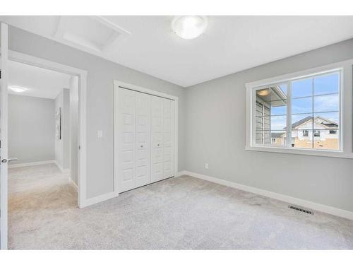 1378 Bayview Crescent Sw, Airdrie, AB - Indoor Photo Showing Other Room