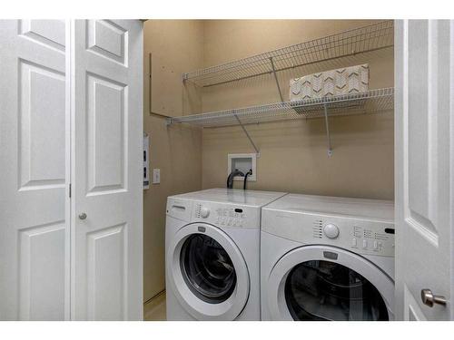 18 Promenade Way Se, Calgary, AB - Indoor Photo Showing Laundry Room