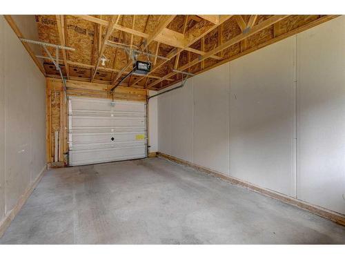 18 Promenade Way Se, Calgary, AB - Indoor Photo Showing Garage