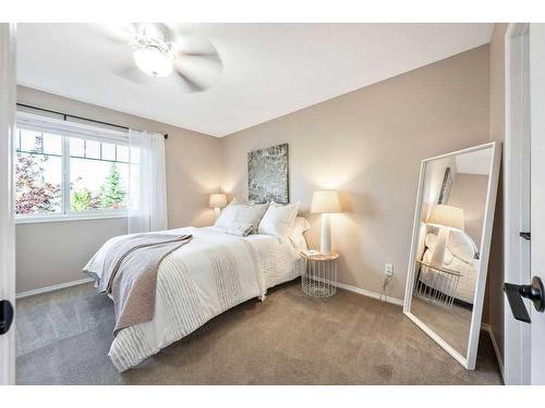 124 Everstone Place Sw, Calgary, AB - Indoor Photo Showing Bedroom