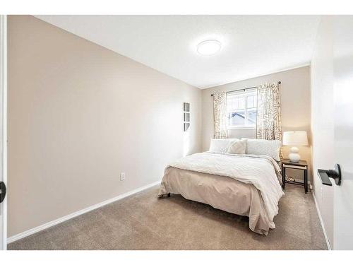 124 Everstone Place Sw, Calgary, AB - Indoor Photo Showing Bedroom