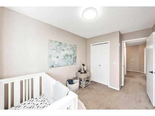 124 Everstone Place Sw, Calgary, AB - Indoor Photo Showing Bedroom