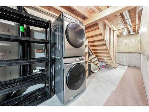 124 Everstone Place Sw, Calgary, AB - Indoor Photo Showing Laundry Room