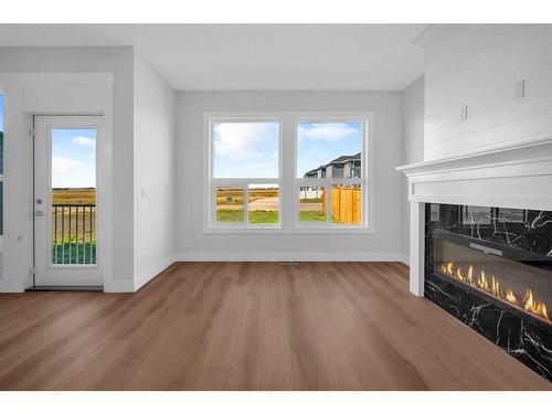 1427 Aldrich Place, Carstairs, AB - Indoor Photo Showing Living Room With Fireplace