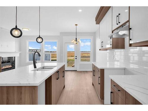 1421 Aldrich Place, Carstairs, AB - Indoor Photo Showing Kitchen With Double Sink With Upgraded Kitchen