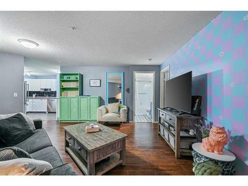 2218-2371 Eversyde Avenue Sw, Calgary, AB - Indoor Photo Showing Living Room