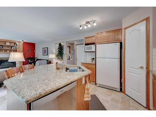 246 Douglas Ridge Mews Se, Calgary, AB - Indoor Photo Showing Kitchen With Double Sink