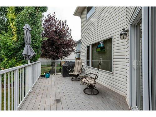 246 Douglas Ridge Mews Se, Calgary, AB - Outdoor With Deck Patio Veranda With Exterior