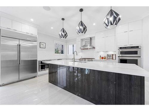 102 Malibou Road Sw, Calgary, AB - Indoor Photo Showing Kitchen With Upgraded Kitchen