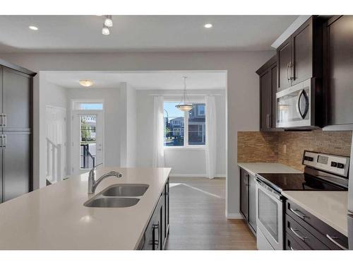 283 Carrington Circle Nw, Calgary, AB - Indoor Photo Showing Kitchen With Stainless Steel Kitchen With Double Sink