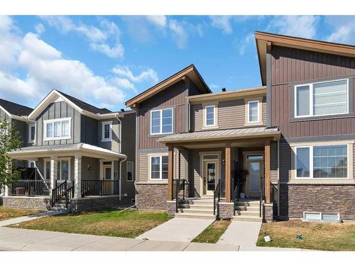 283 Carrington Circle Nw, Calgary, AB - Outdoor With Deck Patio Veranda With Facade