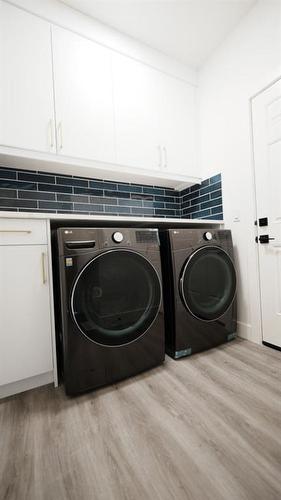 1209 Iron Ridge Avenue, Crossfield, AB - Indoor Photo Showing Laundry Room