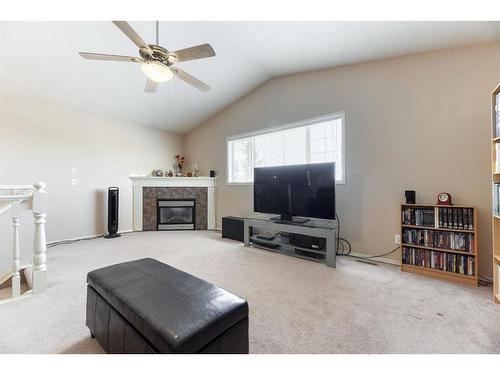 303 Royal Birch View Nw, Calgary, AB - Indoor Photo Showing Other Room With Fireplace