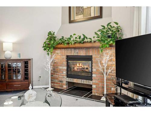 3935 Point Mckay Road Nw, Calgary, AB - Indoor With Fireplace