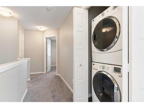 510 Panatella Walk Nw, Calgary, AB - Indoor Photo Showing Laundry Room