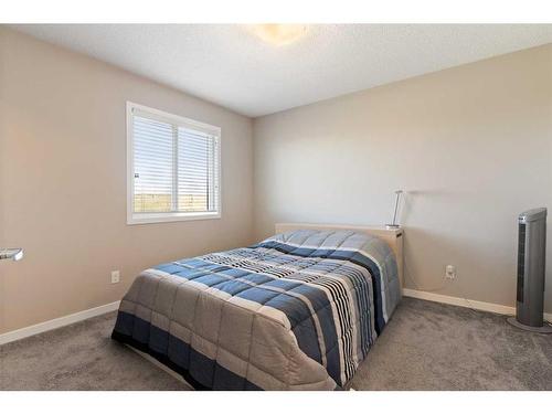 510 Panatella Walk Nw, Calgary, AB - Indoor Photo Showing Bedroom