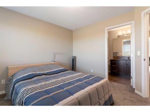 510 Panatella Walk Nw, Calgary, AB - Indoor Photo Showing Bedroom