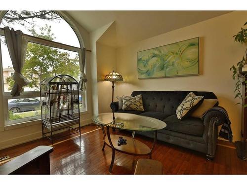 34 Sun Harbour Way Se, Calgary, AB - Indoor Photo Showing Living Room