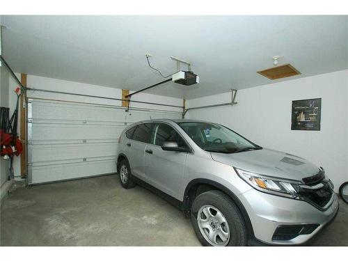 35 Wentworth Gardens Sw, Calgary, AB - Indoor Photo Showing Garage