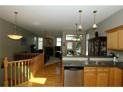 35 Wentworth Gardens Sw, Calgary, AB - Indoor Photo Showing Kitchen With Double Sink