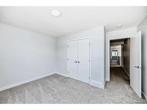 247 Precedence Hill, Cochrane, AB - Indoor Photo Showing Other Room