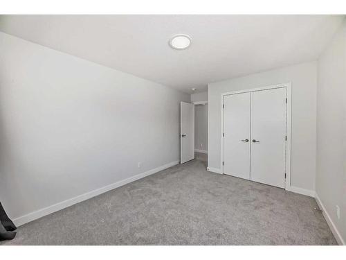 247 Precedence Hill, Cochrane, AB - Indoor Photo Showing Other Room