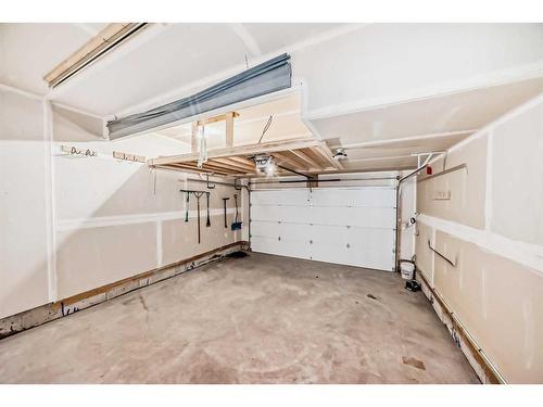 247 Precedence Hill, Cochrane, AB - Indoor Photo Showing Garage