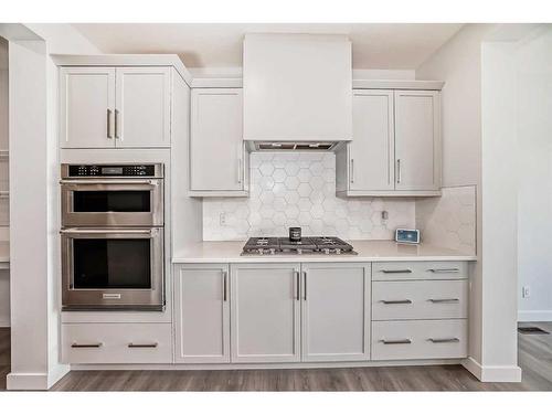 247 Precedence Hill, Cochrane, AB - Indoor Photo Showing Kitchen