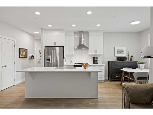 104-8355 19 Avenue Sw, Calgary, AB - Indoor Photo Showing Kitchen With Stainless Steel Kitchen With Upgraded Kitchen