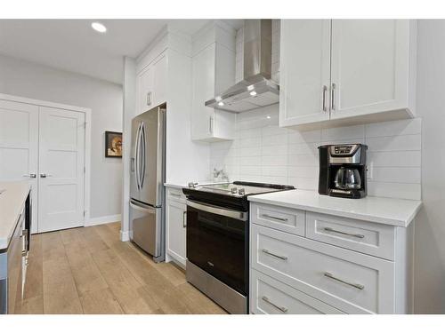 104-8355 19 Avenue Sw, Calgary, AB - Indoor Photo Showing Kitchen With Stainless Steel Kitchen With Upgraded Kitchen