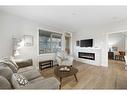 104-8355 19 Avenue Sw, Calgary, AB  - Indoor Photo Showing Living Room With Fireplace 