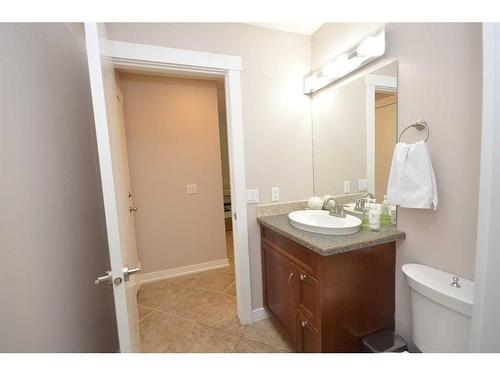 12 Riverside Crescent Se, Calgary, AB - Indoor Photo Showing Bathroom