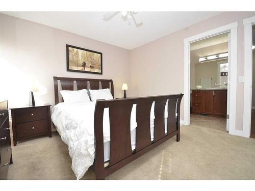 12 Riverside Crescent Se, Calgary, AB - Indoor Photo Showing Bedroom