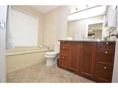 12 Riverside Crescent Se, Calgary, AB - Indoor Photo Showing Bathroom