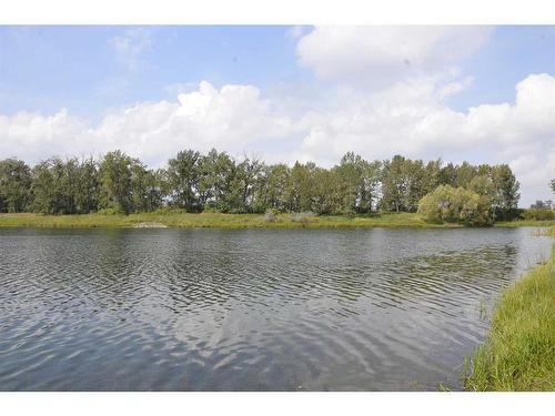 12 Riverside Crescent Se, Calgary, AB - Outdoor With Body Of Water With View