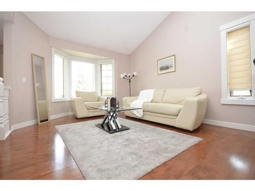 12 Riverside Crescent Se, Calgary, AB - Indoor Photo Showing Living Room