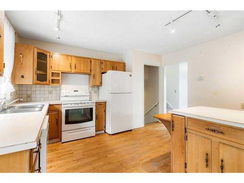 5839 Dalhousie Drive Nw, Calgary, AB - Indoor Photo Showing Kitchen With Double Sink