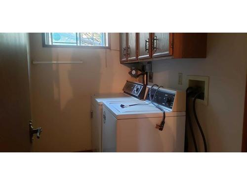 23 Edgewood Place Nw, Calgary, AB - Indoor Photo Showing Laundry Room