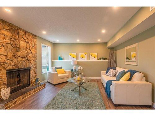 67 Beaconsfield Close Nw, Calgary, AB - Indoor Photo Showing Living Room With Fireplace