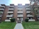 405-903 19 Avenue Sw, Calgary, AB  - Outdoor With Balcony With Facade 