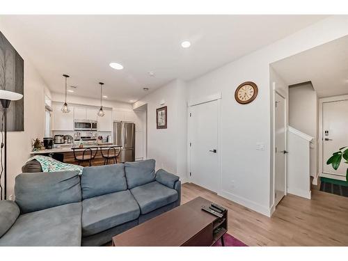 204-414 Seton Passage, Calgary, AB - Indoor Photo Showing Living Room