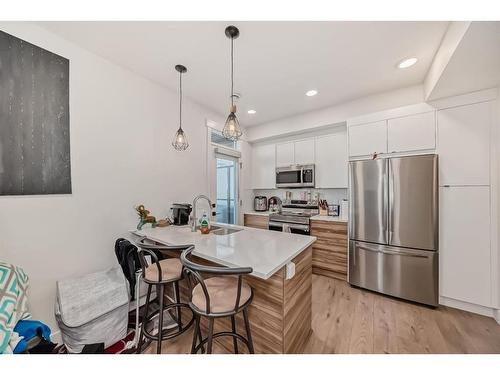 204-414 Seton Passage, Calgary, AB - Indoor Photo Showing Kitchen