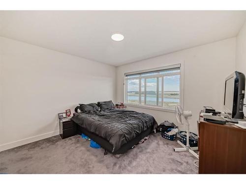 204-414 Seton Passage, Calgary, AB - Indoor Photo Showing Bedroom