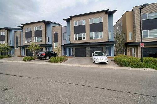 214 Covecreek Circle Ne, Calgary, AB - Outdoor With Balcony With Facade