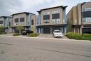 214 Covecreek Circle Ne, Calgary, AB  - Outdoor With Balcony With Facade 