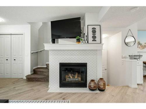 549 Mckenzie Towne Drive Se, Calgary, AB - Indoor Photo Showing Living Room With Fireplace