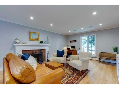 920 Kerfoot Crescent Sw, Calgary, AB - Indoor Photo Showing Living Room With Fireplace